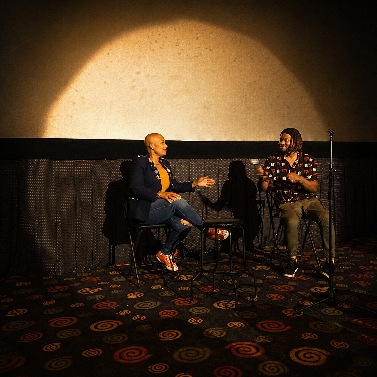 Adam L. McMath in conversation on stage